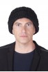 Black Persian Karakul fur hat. Hat with turned-up brim, double-sided fur